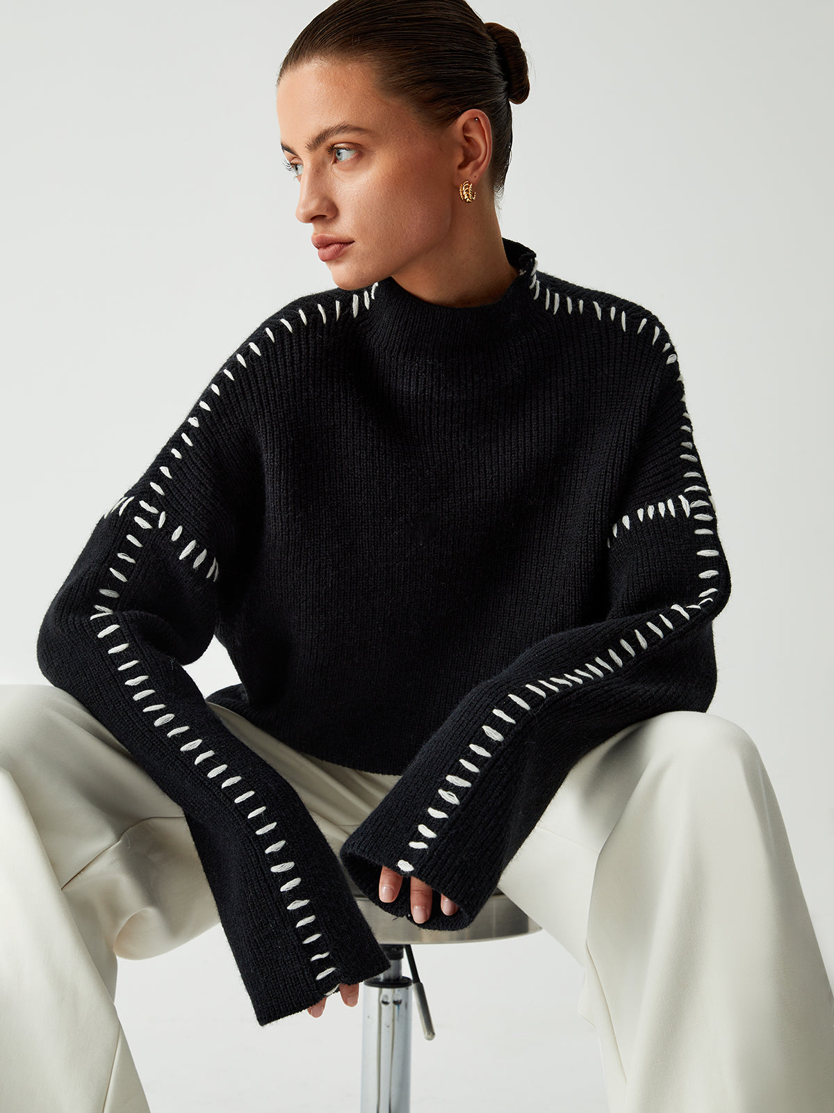 Suéter de cuello alto oversize con detalles de piqué