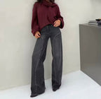 Jeans de mezclilla de pierna ancha con detalles de tachuelas