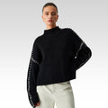 Suéter de cuello alto oversize con detalles de piqué
